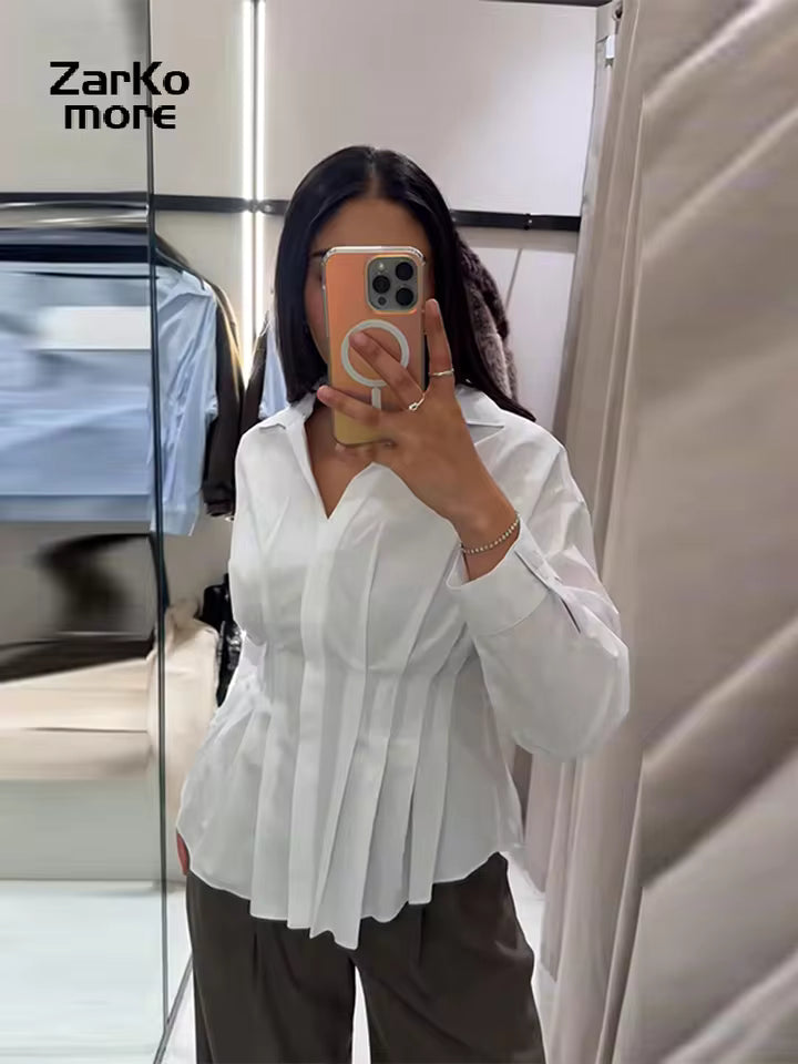 Witte blouse met plooien en knoopjes voor dames