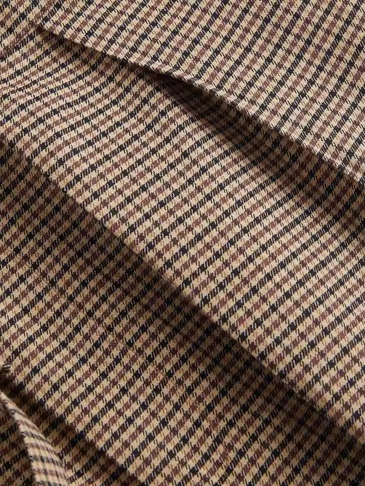 Damesbroek met ruitpatroon en wijde pijpen